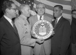 Members of the Air Force presenting the Philadelphia Veterans Advisory Commission with a plaque.