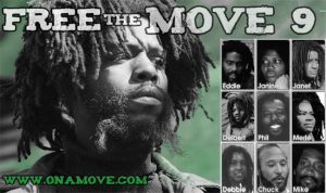 a poster urging the release of the nine MOVE members held in prison, with a photograph of each
