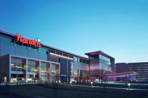 The facade of a modern casino building with red signage reading 
