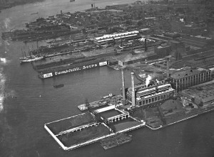 An image of Camden's industrial piers during the early twentieth century, with manufacturing plants for Campbell's Soup and RCA Victor visible.