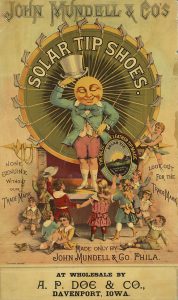 An 1889 advertisement for John Mundell & Co's solar tip shoes shows a man with beaming sun face tipping his hat to a group of children.